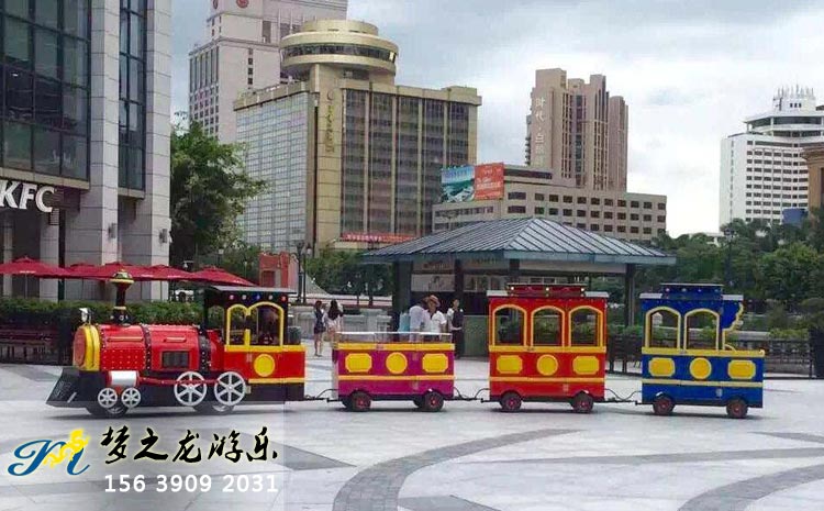 廣場(chǎng)商場(chǎng)觀光電瓶無(wú)軌兒童游樂(lè)小火車(chē)廠(chǎng)家直銷(xiāo)